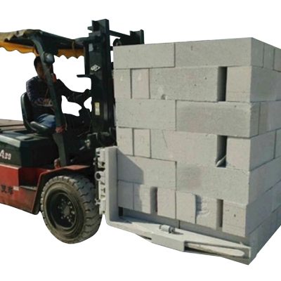 Hydraulinen haarukkatrukki betonitiilien lohkon nostopuristin